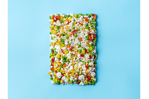Frozen vegetables assorted on blue, a Food & Drink Photo by Fascinadora