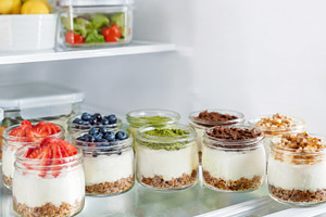 Assorted jars of cheesecake topped w, a Photo by Dvoevnore photos