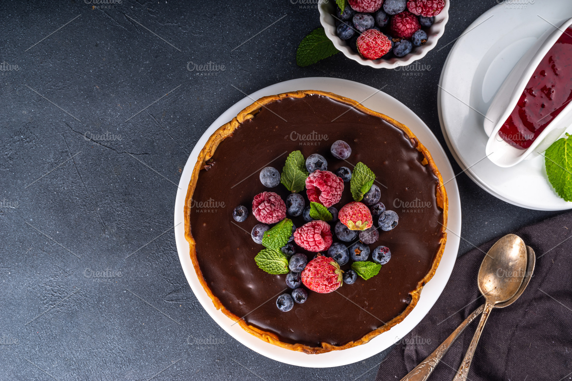 Homemade cheesecake with chocolate and berry, a Food & Drink Photo by Rimma