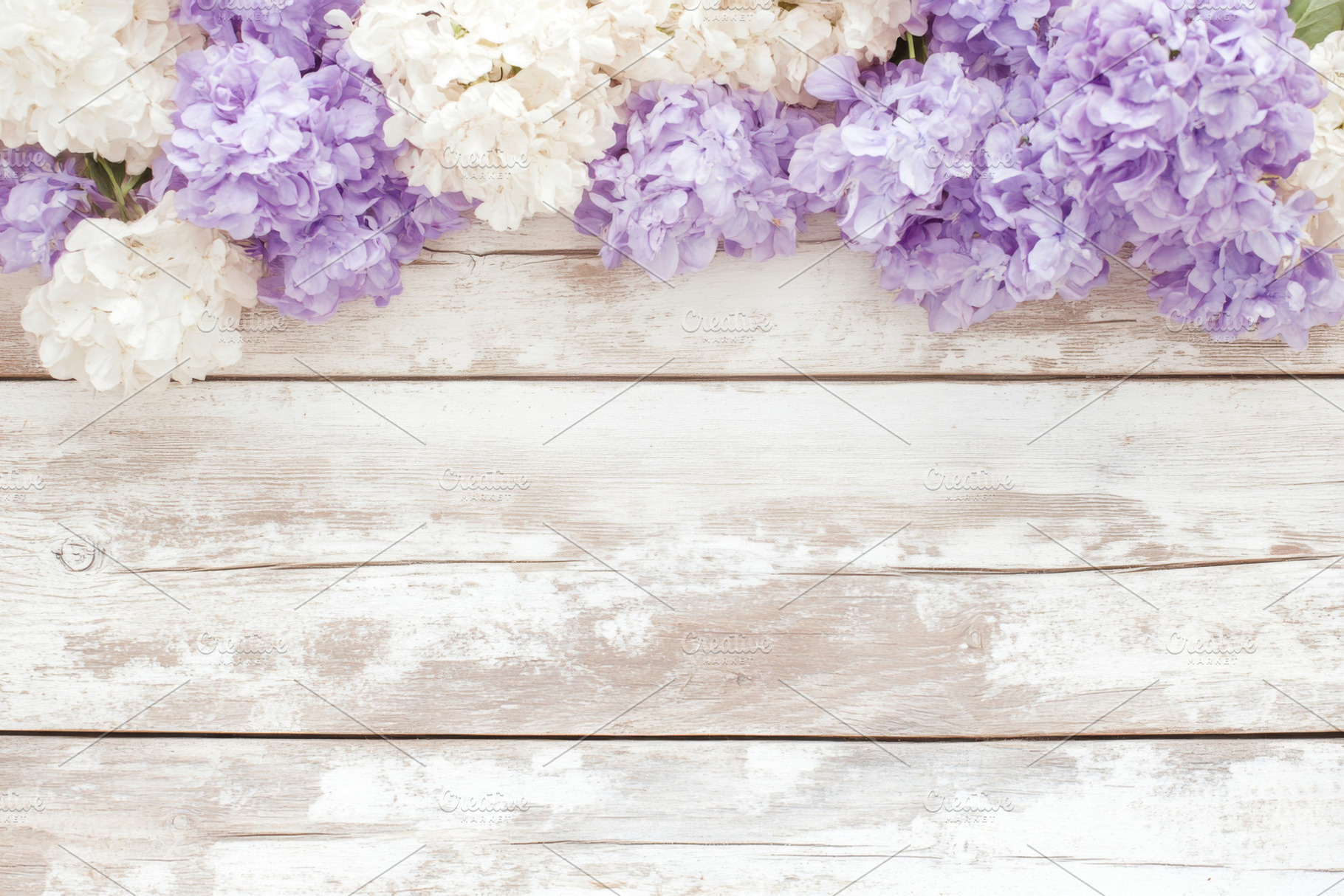 Spring flowers on rustic wooden surf, a Photo by Dvoevnore photos