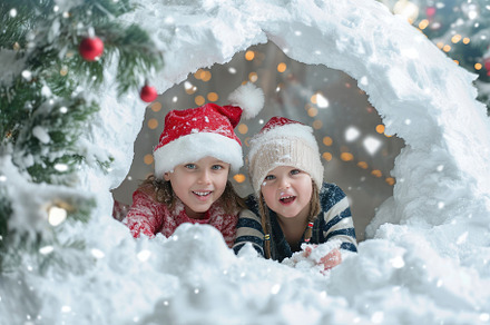 Two young girls playing inside a sno, a Photo by Iftikhar Alam
