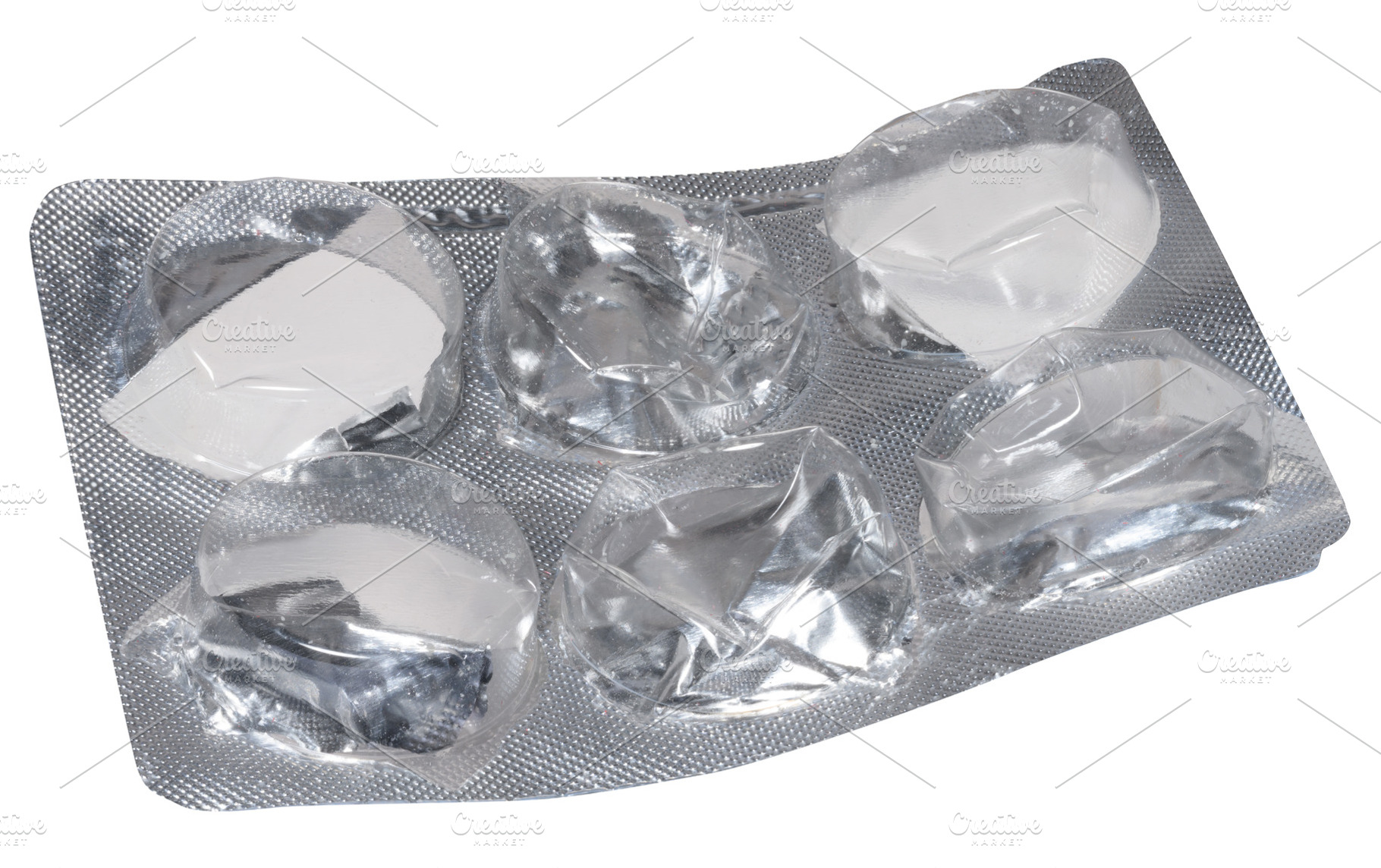 Empty blister pack of round pills on isolated background, a Health & Medical Photo by ndanko