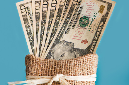 American dollars cash money on the bag featuring money, business, and wealth, a Business Photo by len4foto