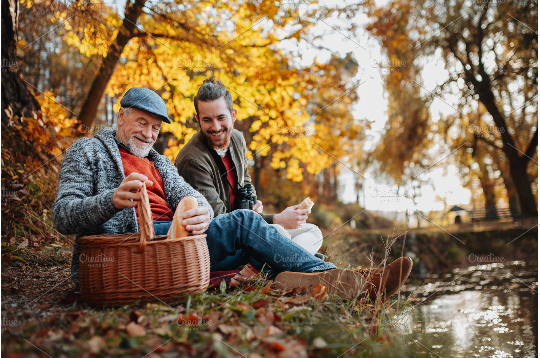 Adult son and father having picnic, a Nature Photo by HalfPoint