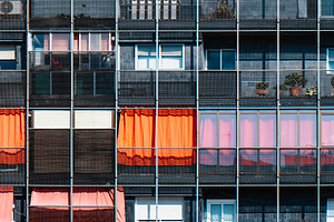 detail of a modern apartment building, a Photo by Nito