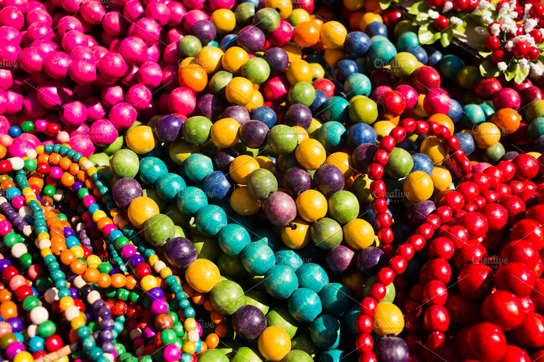 Colorful wooden necklaces stock photo containing bead and closeup, a Beauty & Fashion Photo by Wedphoto