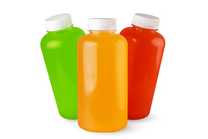 Three bottles of juice in bottles on, a Food & Drink Photo by innakreativ