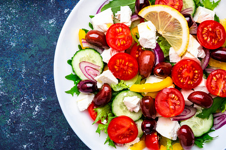 Tasty Greek salad with feta cheese, kalamata olives, tomatoes, p, a Food & Drink Photo by 5PH
