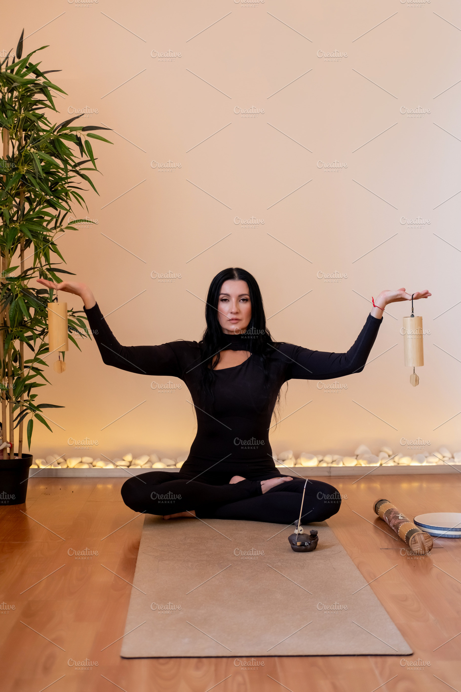 Mindfulness session retreat harmony female chime, a Person Photo by Photo Drive Studio