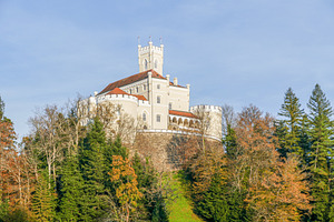 A majestic, cream-colored castle, a Photo by Pozitivo
