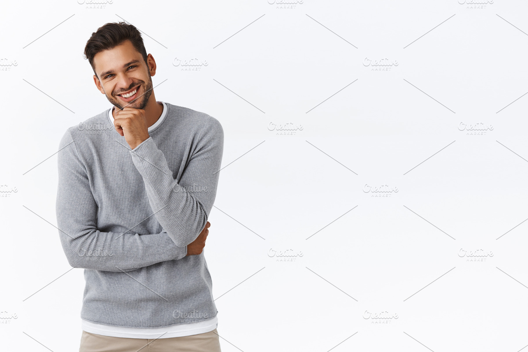 Handsome laughing man look intrigued, a Person Photo by Cookie Studio