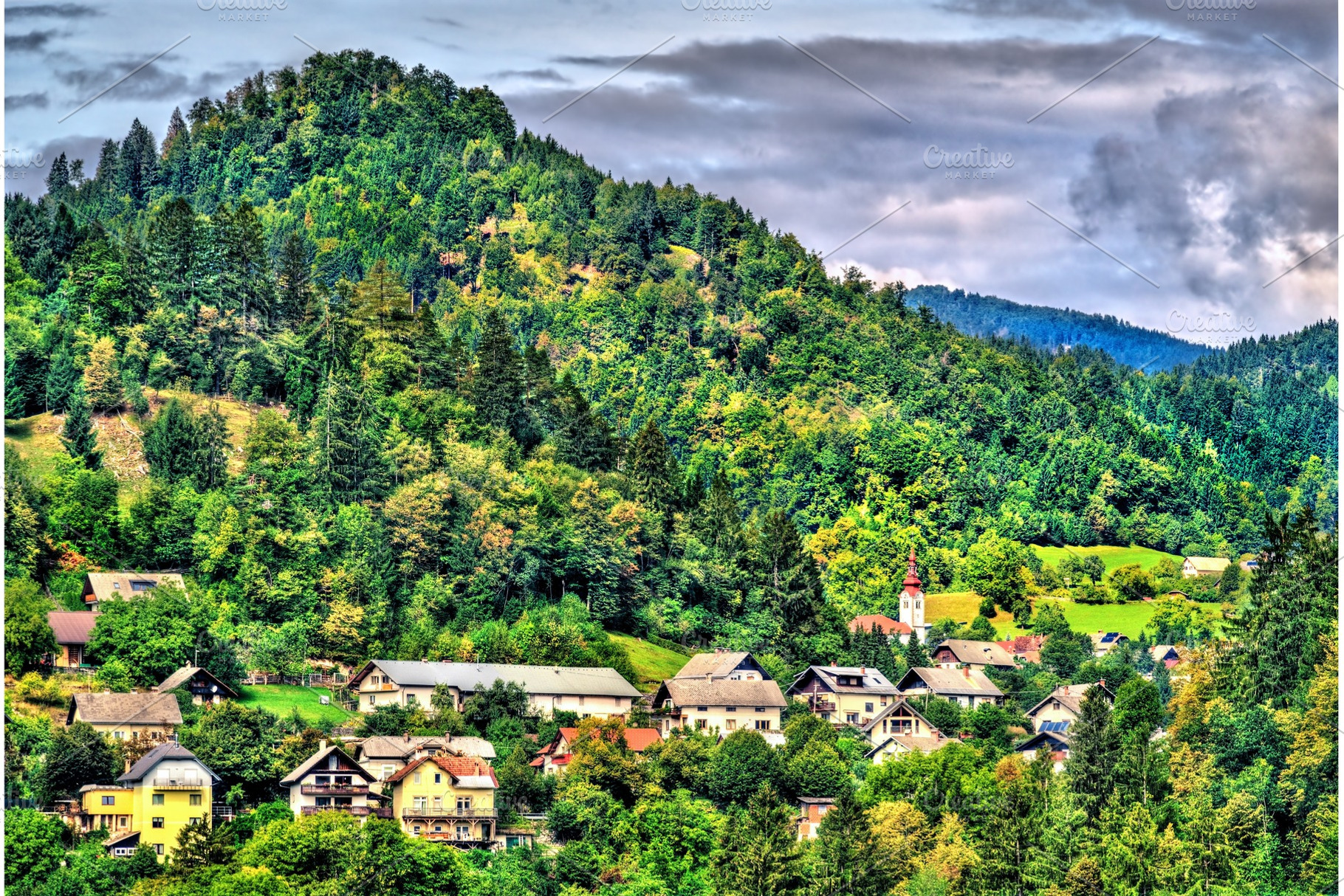 Houses near lake bled in slovenia containing slovenia, bled, and village, a Nature Photo by Leonid Andronov