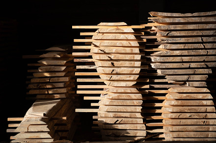 Stacks of cut boards at the woodworker workshop