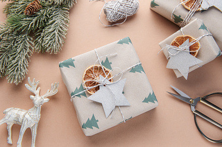 Christmas  gift boxes, clews of rope, paper's rools and decorati, a Holiday Photo by Olena Rudo
