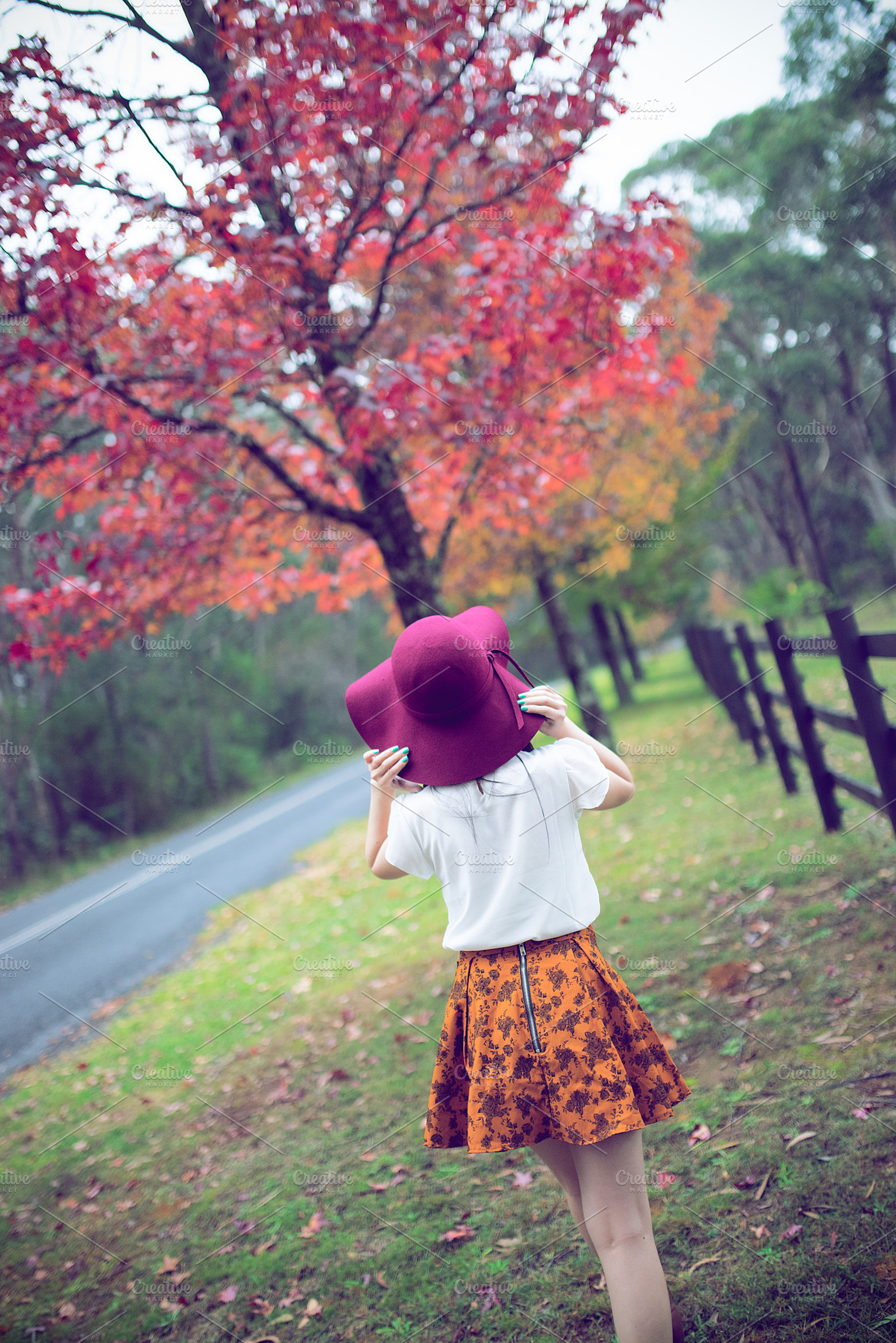 Girl walking Autumn scene