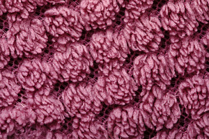 Detailed macro of pink yarn with intricate looped texture, ideal, a Background Photo by Ales Munt