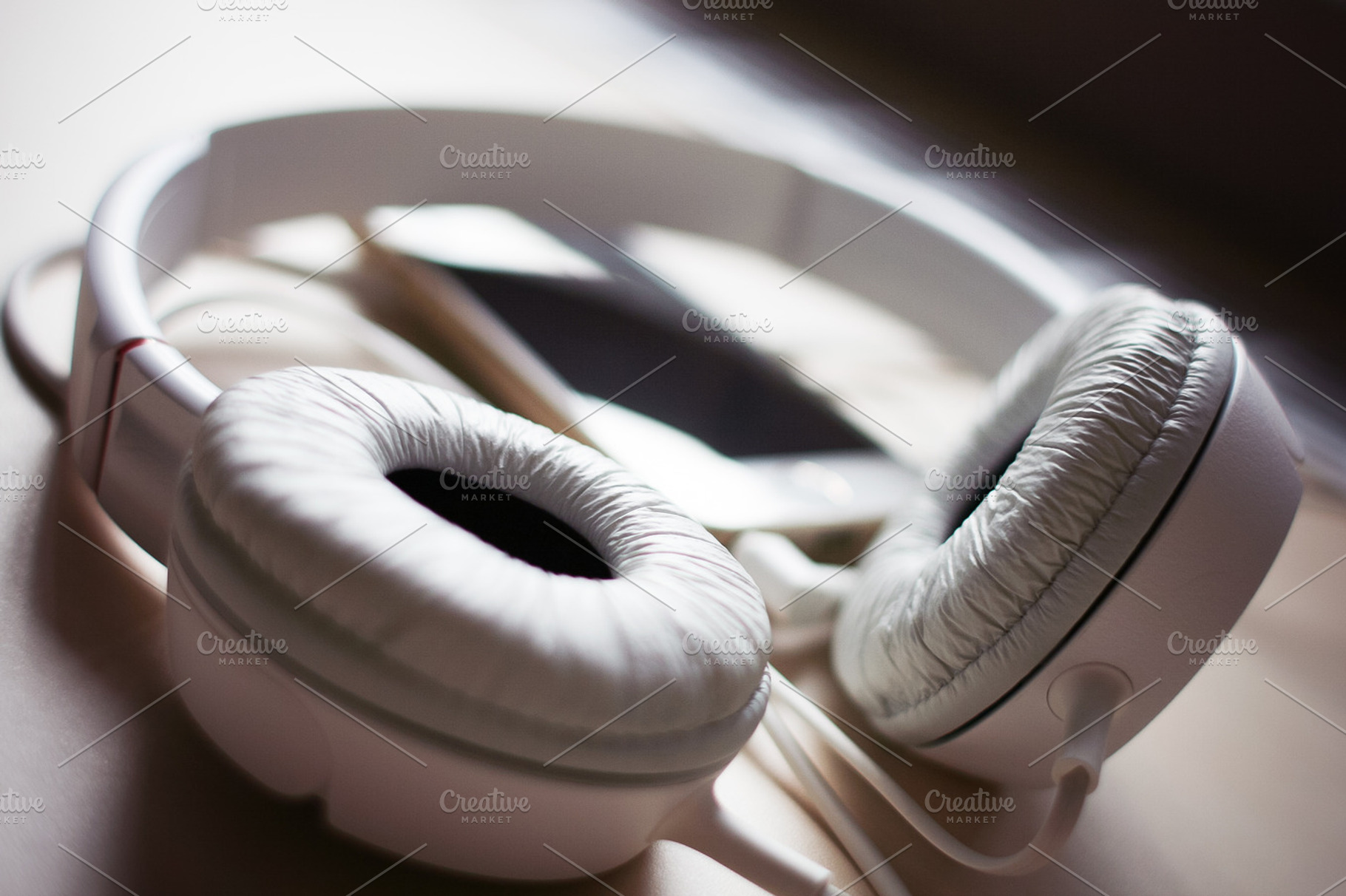 Headphones With Iphone Stock Photo Containing Desk And Headphones
