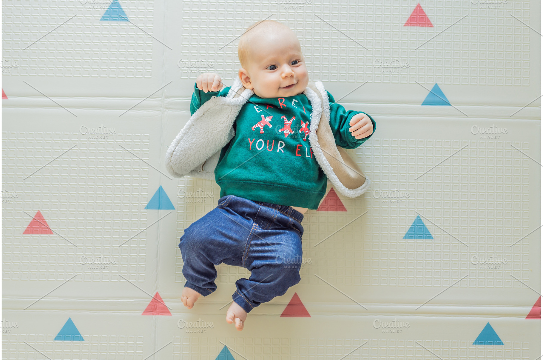 Adorable baby dressed in a Christmas, a Holiday Photo by Elizaveta Galitskaya