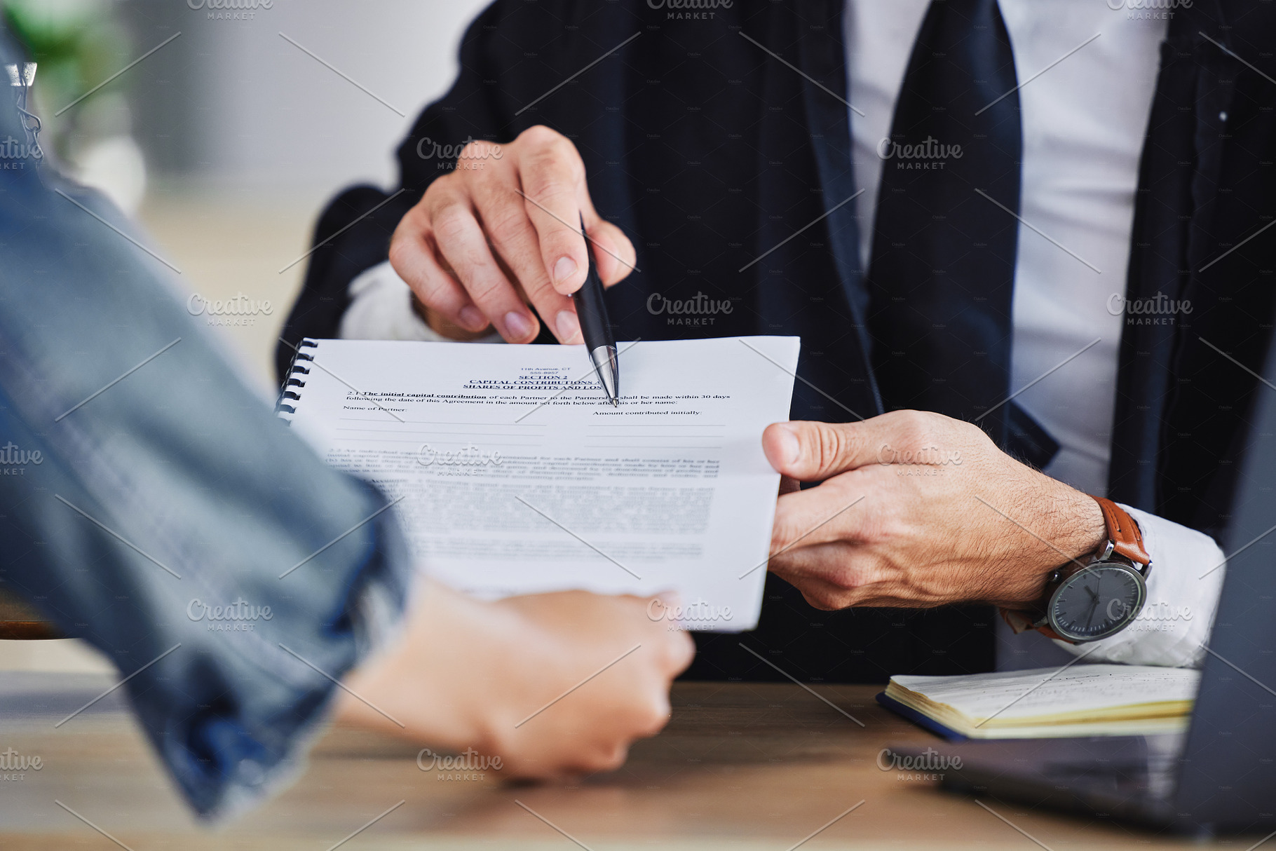 Hands, client and lawyer with paperwork, contract and document for legal advice, application and letter. Closeup of financial advisor, broker and consulting report, documents and reading deal to sign, a Photo by Peopleimages.com