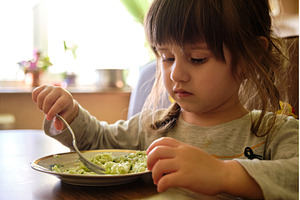 Little girl eating cabbage salad, a Food & Drink Photo by Rohan Photography