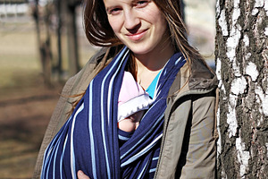 Newborn baby sleeping in the sling, a Photo by saiko3p