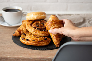 Hand Taking Croissant, a Food & Drink Photo by etorres69