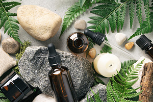 Natural Wellness Setup with Essential Oils and Botanicals, a Health & Medical Photo by Natalia Klenova's Shop
