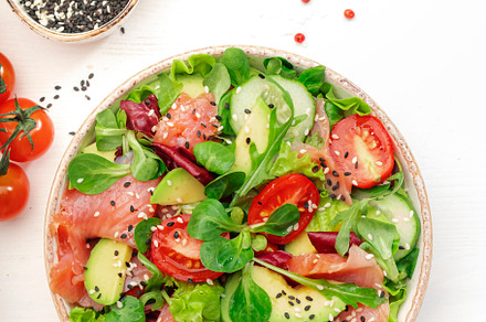 Spring salad with salted salmon, avocado, tomatoes, cucumber, bl, a Food & Drink Photo by 5PH