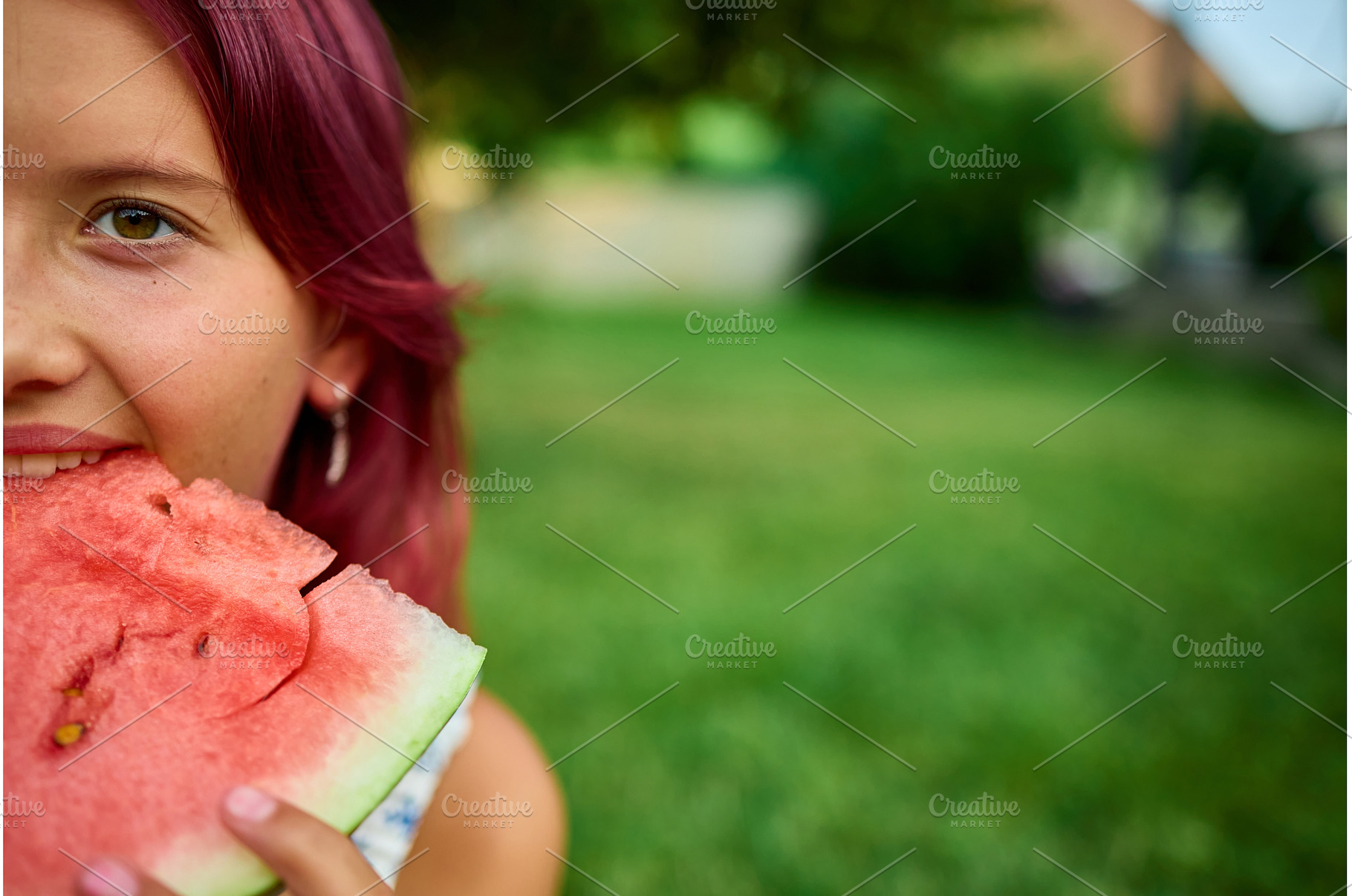 Teen girl enjoying a juicy slice of, a Nature Photo by IlliaBondarPhotography