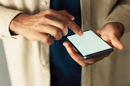 Mockup of man's hands holding phone