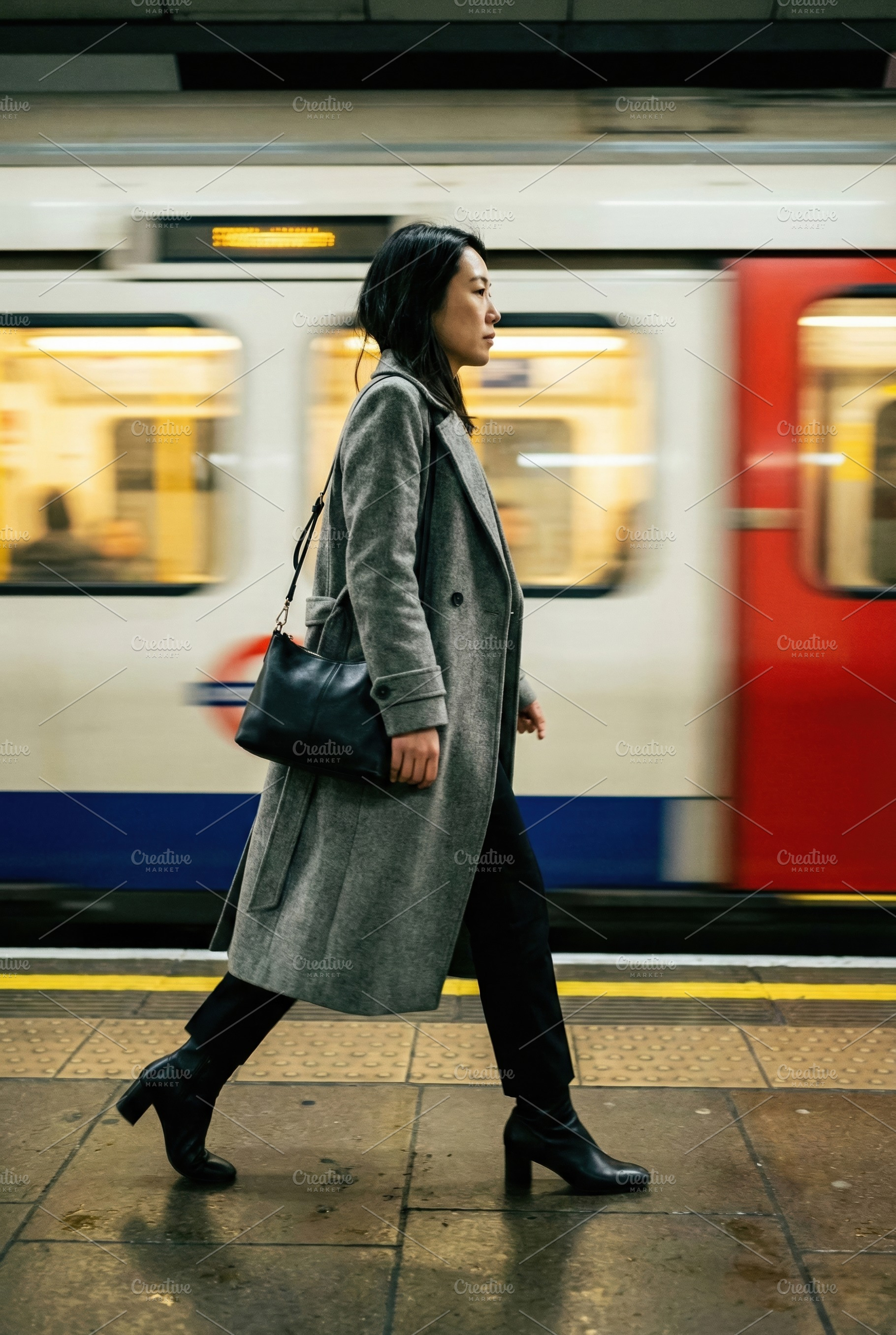 Asian Woman Walking on Platform, a Person Photo by Virgo Studio