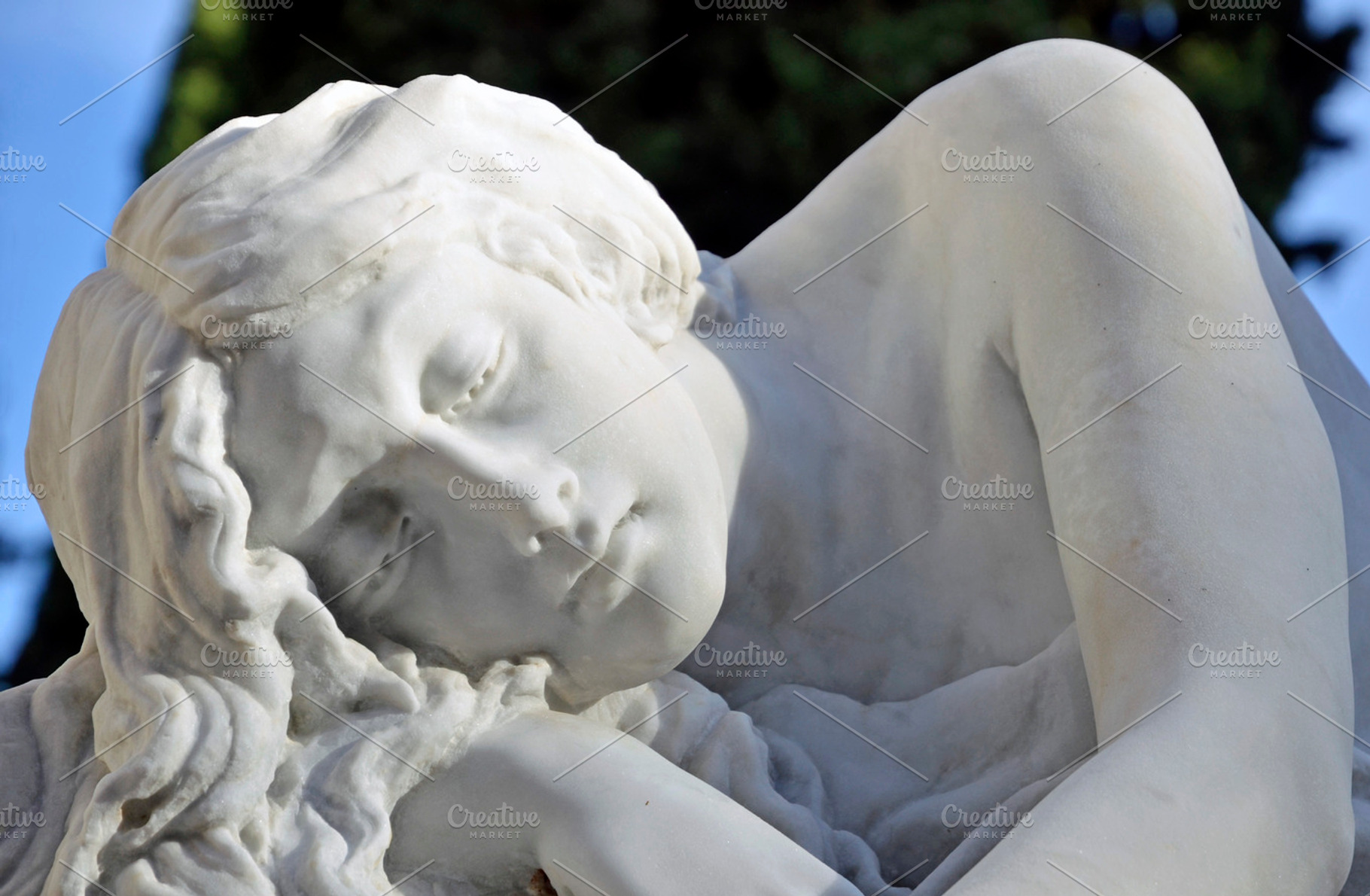 sculpture woman resting in the cemetery, an Architecture Photo by neftali77