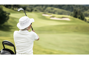 Elderly woman playing golf on a, a Sports & Recreation Photo by Sergey Kotenev