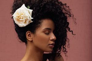 Young slim female with a flower, a Person Photo by Artem Varnitsin