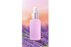 Frosted pink dropper bottle with, a Beauty & Fashion Photo by Lermont51