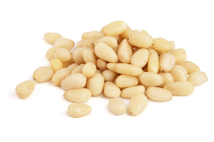 Shelled cedar pine nuts isolated on white background featuring nut, pine, and, a Food & Drink Photo by NataPhoto