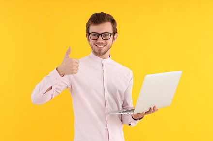 Concept of people, young man on yellow background, a Person Photo by AtlasStudio PRO