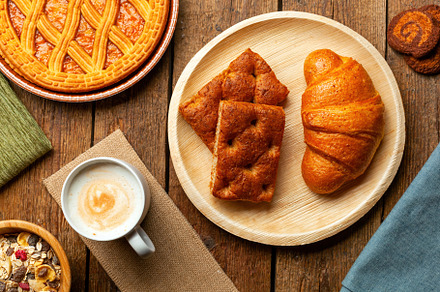 Delicious Italian breakfast with cappuccino, croissant, schiacciata and crostat, a Food & Drink Photo by Antonio Gravante Market