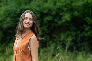 Portrait of young woman smiling, a Person Photo by HalfPoint