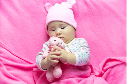 Baby sleeps with a bear. Selective, a Person Photo by yanadjana