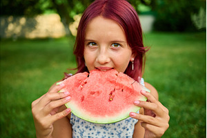 Teen girl enjoying a slice of, a Nature Photo by IlliaBondarPhotography