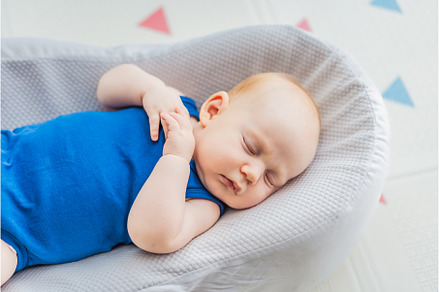 Chubby 3-month-old baby peacefully