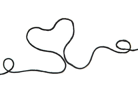 Black thread isolate on white, a Background Photo by yanadjana