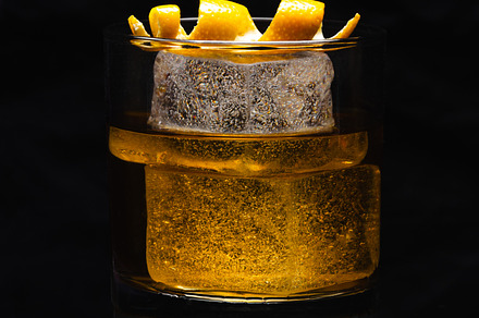 Whiskey glass on the rocks.