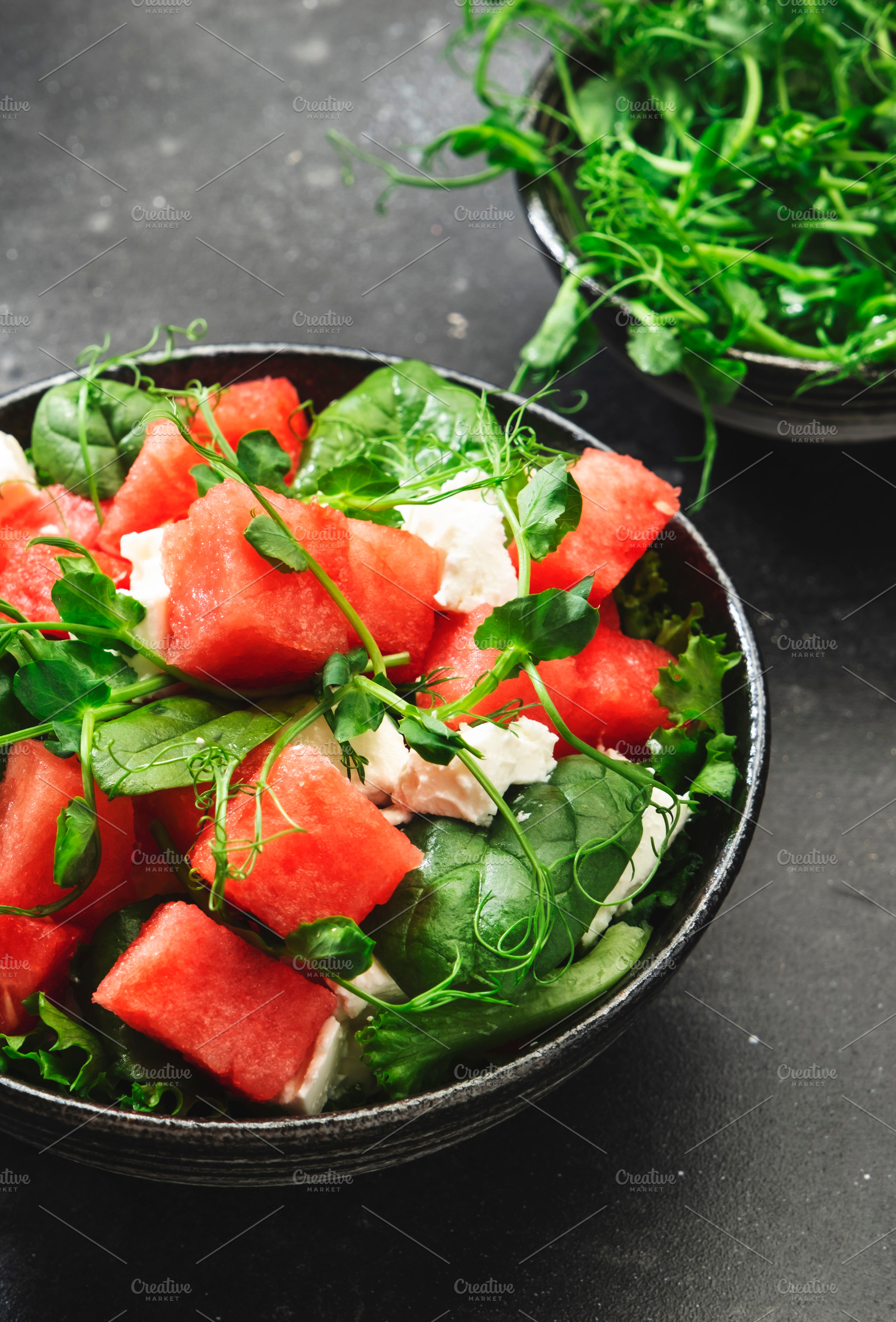 Watermelon salad bowl with soft goat cheese, spinach and pea spr, a Food & Drink Photo by 5PH