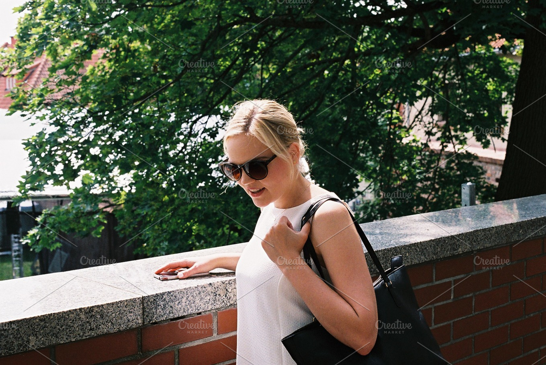 Beautiful blond girl with her phone, a Person Photo by Kasia Górska