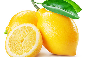 Ripe lemon fruits isolated white, a Food & Drink Photo by Volff