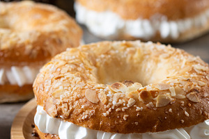Close-up of a traditional Spanish Roscón de Reyes filled with whipped cream, d, a Food & Drink Photo by etorres69