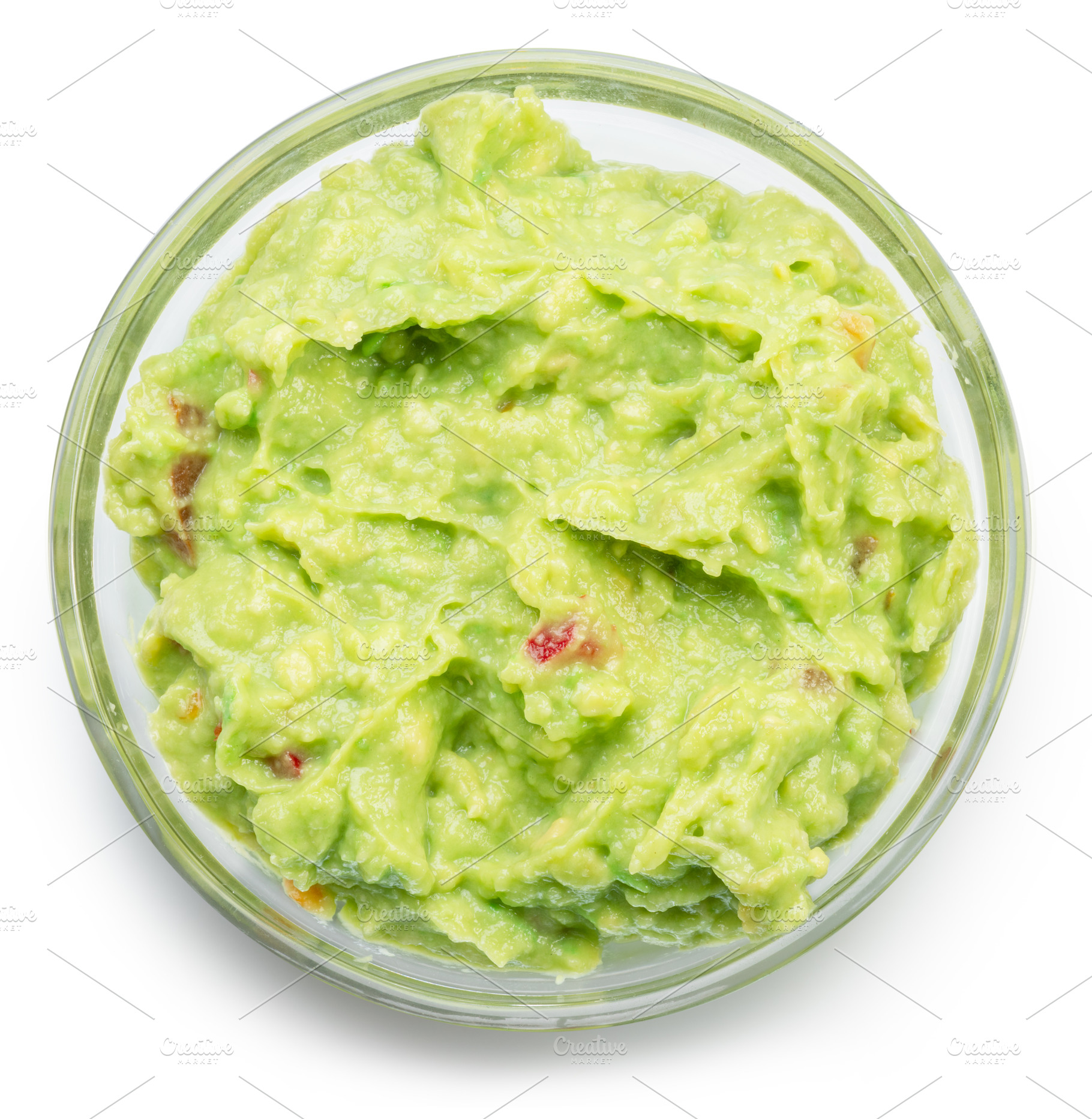 Glass bowl of guacamole on white background. Top view. File cont, a Food & Drink Photo by Volff