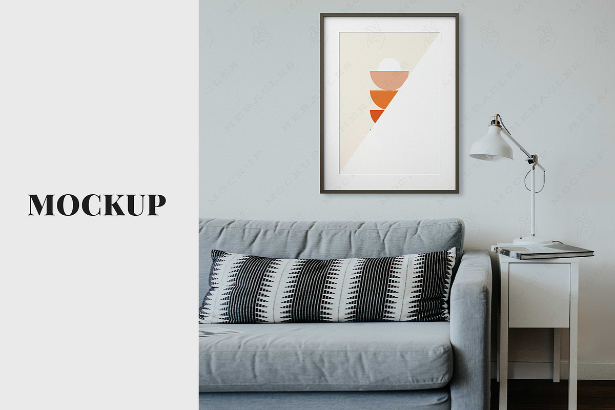 Black Frame Mockup Over Couch, a Print Template by HeraclesVisuals